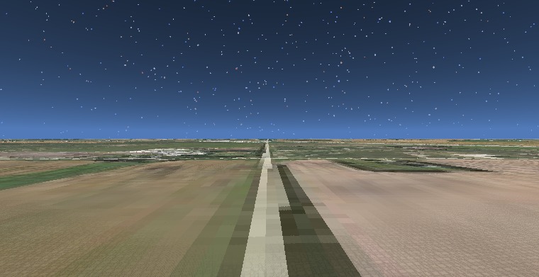 Aerial free-camera over the Great Plains — the satellite-imagery-textured terrain mesh built from real-world elevation data.
