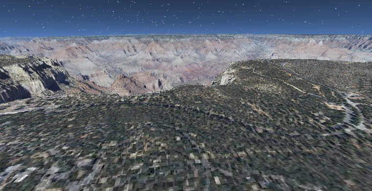 Grand Canyon from the air — high-relief AWS elevation data driving the satellite-textured terrain mesh.
